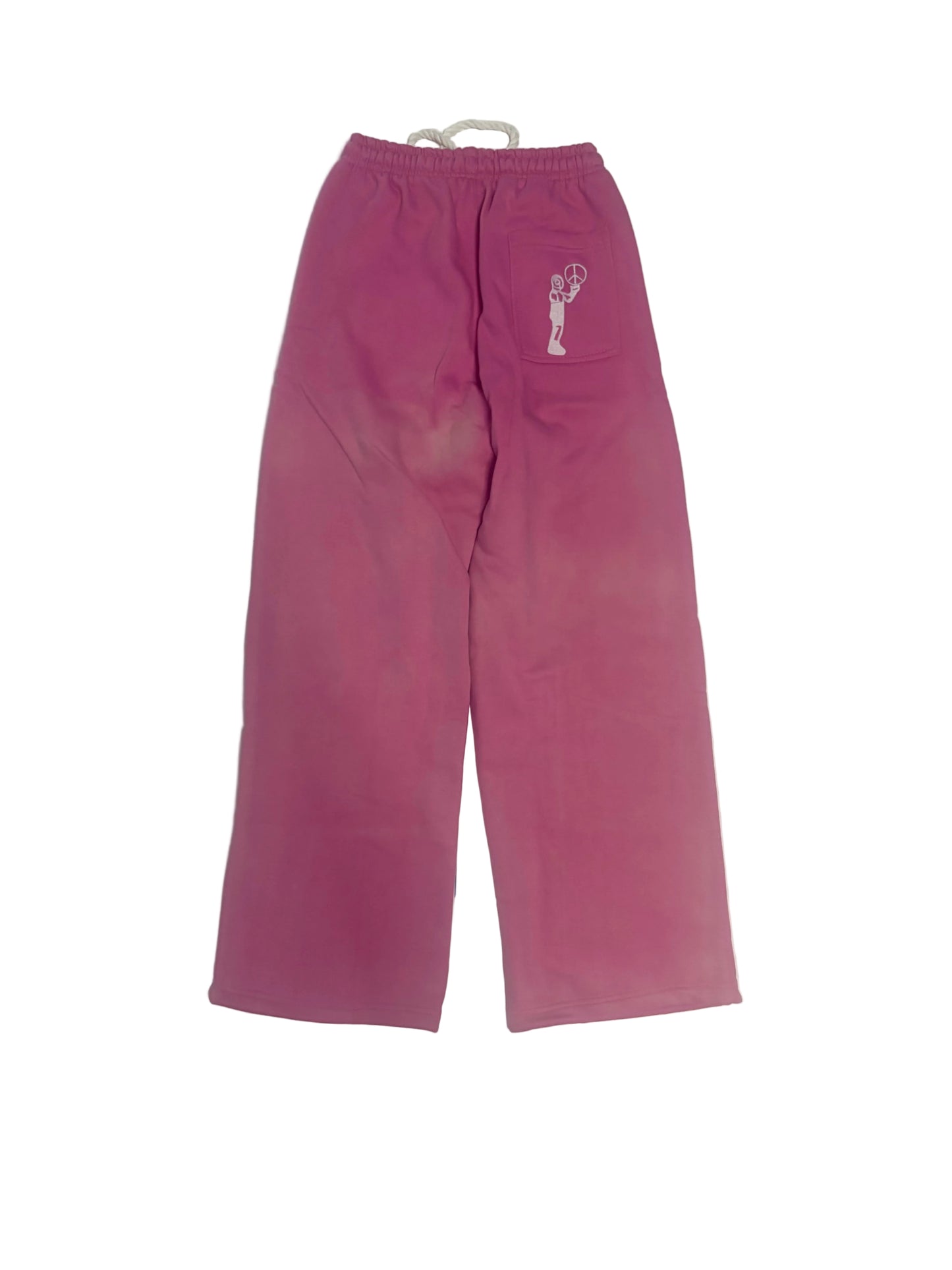 A pair of pink wide-leg sweatpants with an elastic waistband and a small white graphic on the upper right leg, laid flat on a white surface.